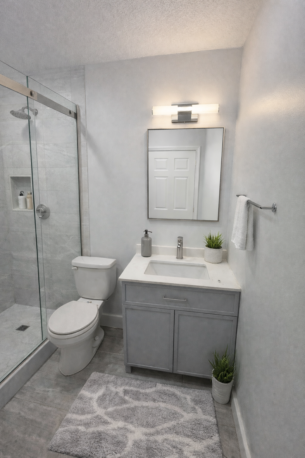Hallway bathroom renovation by Uprise Remodeling