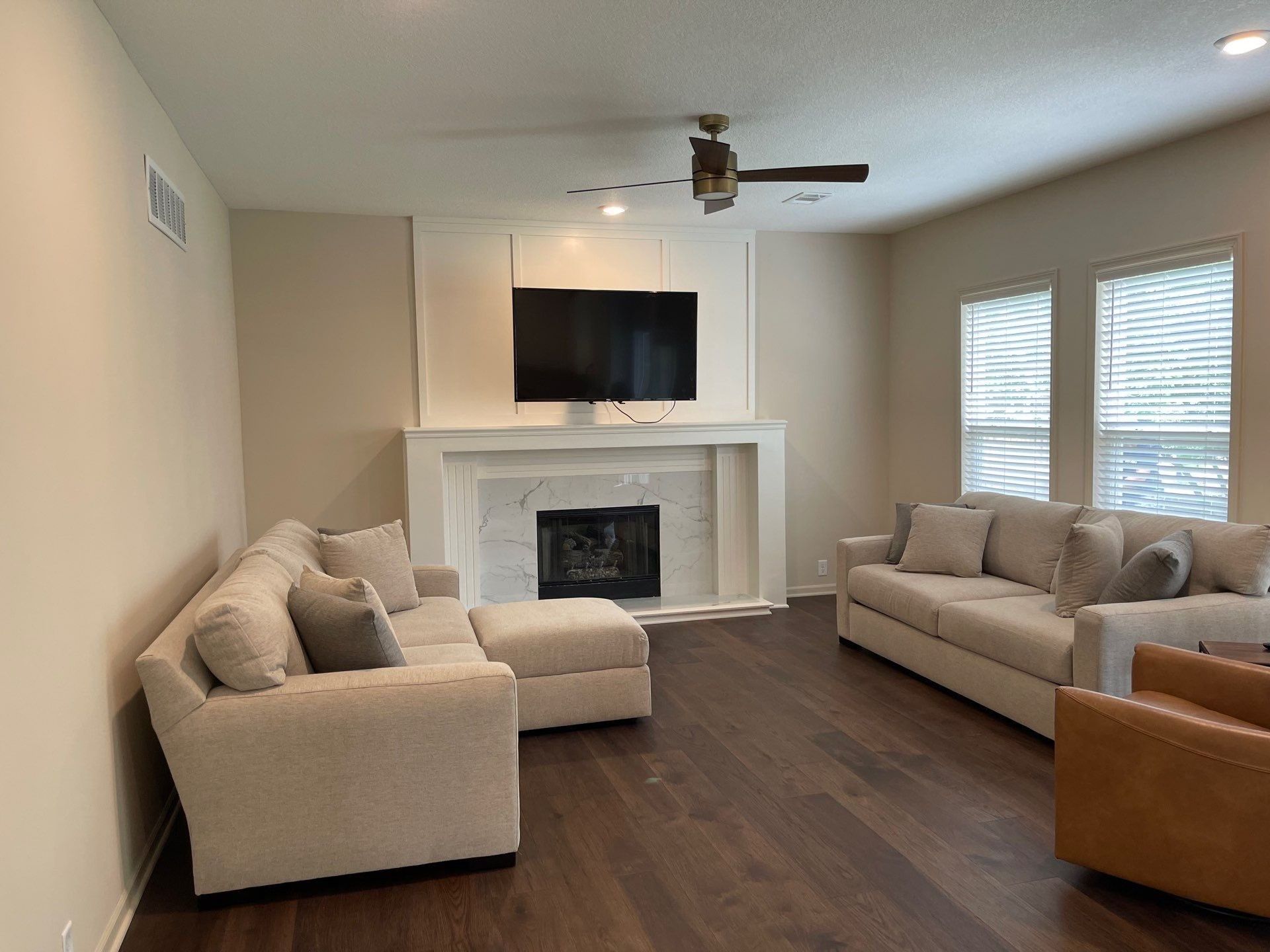 Home exterior with new porch by Uprise Remodeling